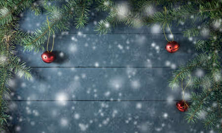 Christmas arrangement with pine branches and toys. On a blue wooden backgroundの写真素材