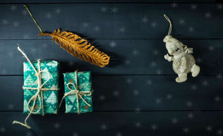 New Year's gifts and toys on a blue wooden backgroundの写真素材