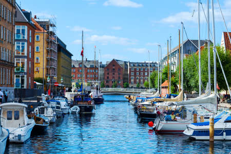 Copenhagen, Denmark - July 9, 2018. Beautiful yachts and ships on the canal. Water transport. Architecture. City landscape travelsのeditorial素材
