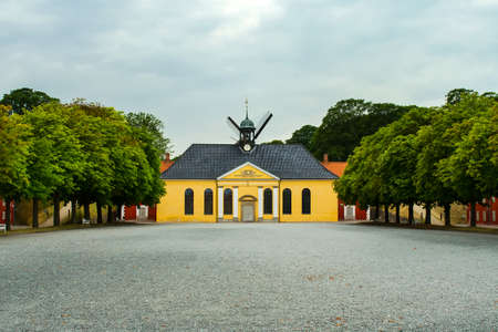 Copenhagen, Denmark - July 10, 2018. Fortress Castellet, Beautiful architecture. Yellow building with beautiful windows and a roof made of shingles. Architecture. Sights.のeditorial素材