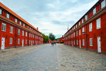 Copenhagen, Denmark - July 10, 2018. Fortress Castellet, Beautiful architecture. Yellow building with beautiful windows and a roof made of shingles. Architecture. Sights.のeditorial素材