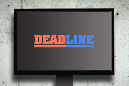 Dead Line. The inscription on the monitor. Gray concrete background. Concept business finance.の写真素材