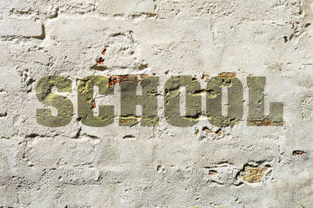 School, the inscription on an old brick wall. Education. Backgroundの写真素材