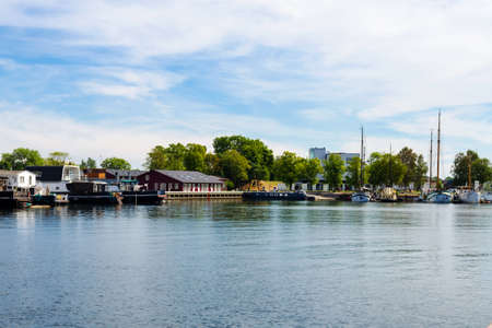 Copenhagen, Denmark - July 12, 2018 Canal of Copenhagen with old ships. A hot sunny day. Travel, architecture. City landscapeのeditorial素材