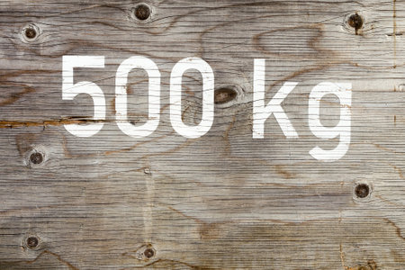 Old antique gray wooden background. The letter is 500 kg. Background. texturesの写真素材