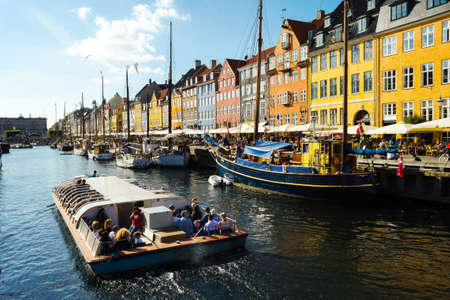 Copenhagen, Denmark - July 7, 2018. Streets of Copenhagen. Beautiful colorful houses on the canal. Nyhaven. City landscape. Architecture Travelsのeditorial素材