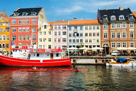 Copenhagen, Denmark - July 13, 2018. Streets of Copenhagen. Beautiful colorful houses on the canal. Nyhaven. City landscape. Architecture Travelsのeditorial素材