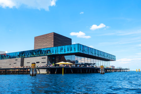 Copenhagen, Denmark - July 13, 2018. Beautiful modern architecture of Copenhagen on the bank of the canal. Ofelia Plads Architecture. City landscape. Travels.のeditorial素材