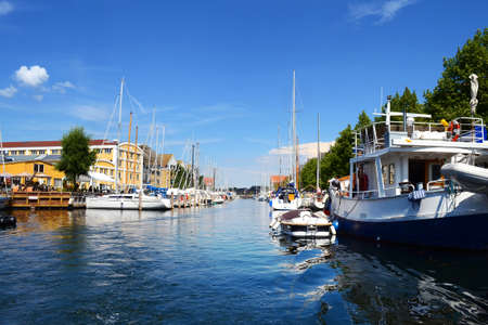 Copenhagen, Denmark - July 13, 2018. Beautiful yachts and ships on the canal. Water transport. Architecture. City landscape travelsのeditorial素材