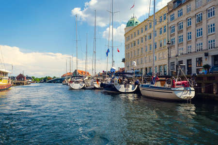Copenhagen, Denmark - July 13, 2018. Beautiful yachts and ships on the canal. Water transport. Architecture. City landscape travelsのeditorial素材