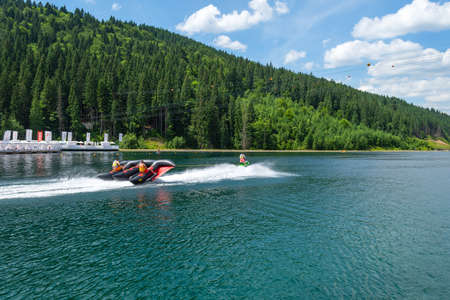 Bukovel. Ukraine. 17. July. 2021. Lake of Youth. Extreme water activities Carpathians Summer Vacation Travelのeditorial素材