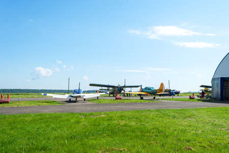 Gorodok. Ukraine. June 6, 2021. Tsuniv airfield. Biplane, and a training aircraft, parked at the...