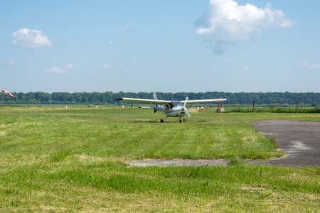 Gorodok. Ukraine. June 6, 2021. Tsuniv airfield. Training aircraft, taxiing to the runway. Sport Extreme entertainment Transport Relaxationのeditorial素材