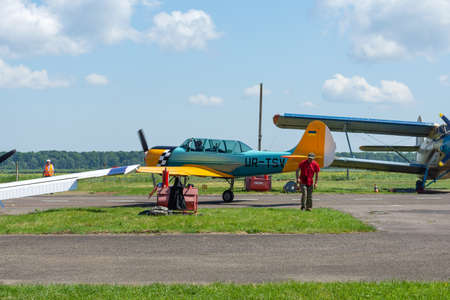 Gorodok. Ukraine. June 6, 2021. Tsuniv airfield. Training aircraft, taxiing to the runway. Sport Extreme entertainment Transport Relaxationのeditorial素材