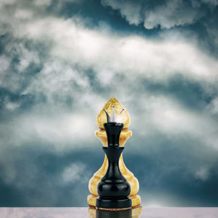 Small black chess queen in front of a white pawn. Career failure concept. Failure. Business.の写真素材