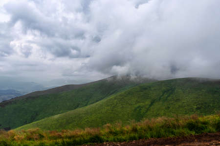 Beautiful mountain landscape with lovely storm clouds. Carpathians. Ukraine. Mountain landscape. Freedom. Tourism Travelsの写真素材