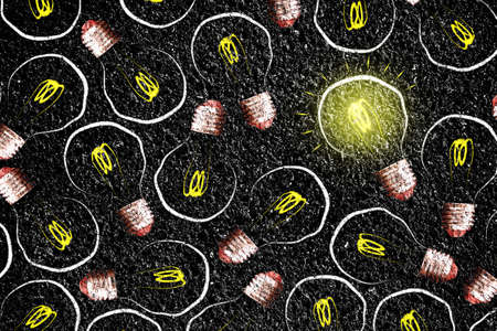 Glowing light bulb on the asphalt background. The concept of new ideas and creative solutions. Business.の写真素材