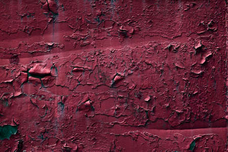 Grunge background of an old cracked red painted iron plate. Textures. Backgroundの写真素材