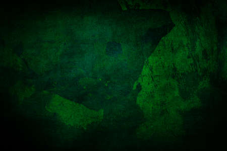 Old, shabby dark green grunge texture. Vignette. Backgrounds Texturesの写真素材