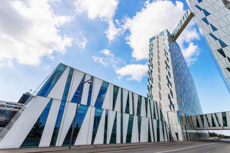Copenhagen. Denmark. July 24th. 2019: The beautiful glass building of the Bella Sky Comwell Hotel....