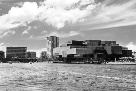 Beautiful glass building on the canal. Copenhagen. Denmark. Modern architecture. Black and white...