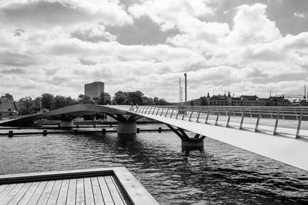 Beautiful pedestrian, bicycle bridge over the canal. Denmark. Copenhagen.Black and white photo. Architecture Sights Travelsのeditorial素材