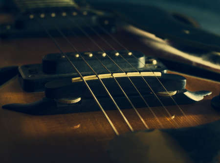 Close up image of electric guitar. On the dark-blue backgroundの写真素材