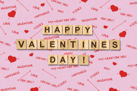 Happy Valentines Day lettering on wooden blocks. Holiday background.の写真素材