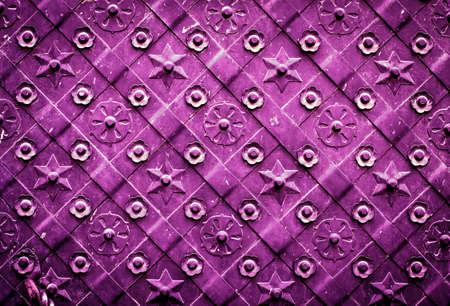 Ornament. Old steel door Toned photo Backgroundの写真素材