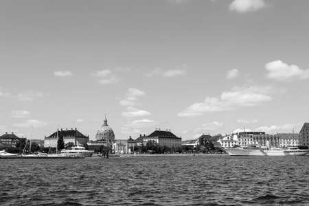 Beautiful architecture of Copenhagen on the canal with ships and yachts. Black and white photo. Architecture. Denmark. Sightの写真素材