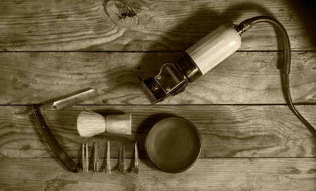 Vintage set of Barbershop.Toning sepia On the old wooden backgroundの写真素材