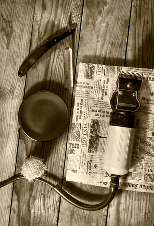 Vintage set of Barbershop.Toning sepia On the old wooden backgroundの写真素材