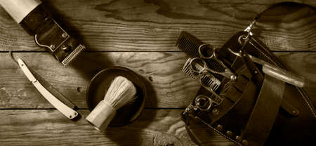 Vintage set of Barbershop.Toning sepia On the old wooden backgroundの写真素材