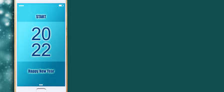 2022. Start. Button on a smartphone, on a green background. Concept for the start of the New Year...