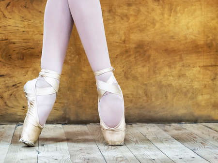 Legs of a ballerina in pointe shoes. A close-up. Copy space.の写真素材