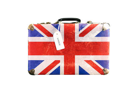 Old suitcase with the flag of England. Isolated on a white background.の写真素材