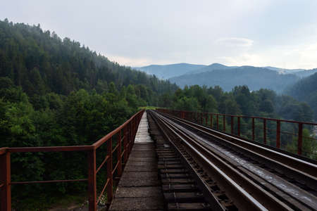 Railway bridge among beautiful mountains. Travels. Transportの写真素材