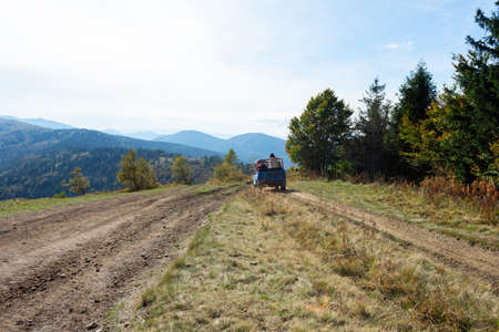 SUV on a country mountain road. The Carpathians. Ukraine. Travels. Transport.の写真素材