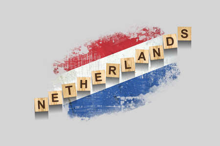 Netherlands. The inscription on wooden blocks, against the background of the flag of the Netherlands. 3D illustration. Isolated on a gray background. Design elementの写真素材
