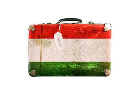 Old suitcase with the flag of Hungary. Isolated on a white backgroundの写真素材