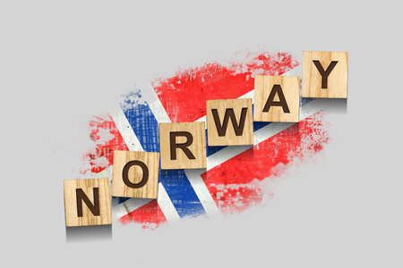 Norway. The inscription on wooden blocks, against the background of the flag of Norway. 3D illustration. Isolated on a gray background. Design elementの写真素材