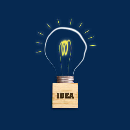 Concept Idea. Light bulb on a blue background. The concept of bright ideas for business, frequently asked questions, creative inspiration. Business. Creation. Creativity background.の写真素材