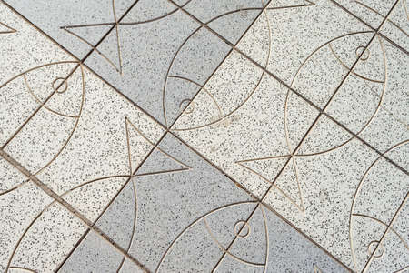 Texture of beautiful outdoor tiles with fish. Backgrounds Textures.の写真素材