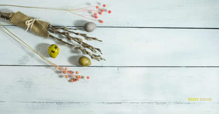 Easter colorful eggs i on a white wooden background Top viewの写真素材