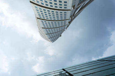 Malmo. Sweden. July 29.2019. Turning Torso, a beautiful skyscraper against a cloudy sky. View from below Architecture. Attractionsのeditorial素材