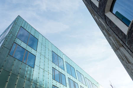 Malmo. Sweden. July 29, 2019. Beautiful modern glass and brick building. Bottom view Architectureのeditorial素材