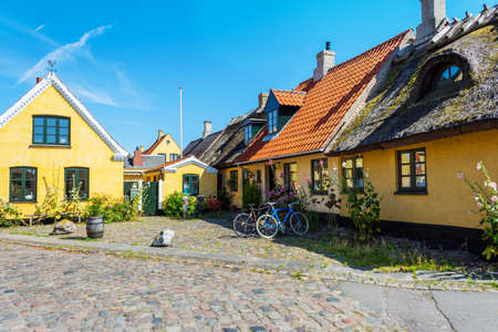 Dragor. Denmark. July 24, 2019 Beautiful, small, yellow rustic houses. Traditional Scandinavian style. Fishing village Sights Travelsのeditorial素材