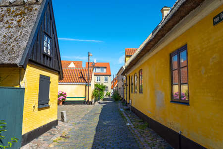 Dragor. Denmark. July 24, 2019 Beautiful, small, yellow rustic houses. Traditional Scandinavian style. Fishing village Sights Travelsのeditorial素材