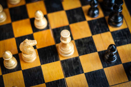 White chess queen, on the chessboard. selective focus. view from above. strategy. sport. business backgroundの写真素材
