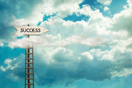 success. Wooden sign with an arrow indicating the direction. Stairs. The concept of the right choice. Way to success. copyspace. business. lifestyle. backgroundの写真素材